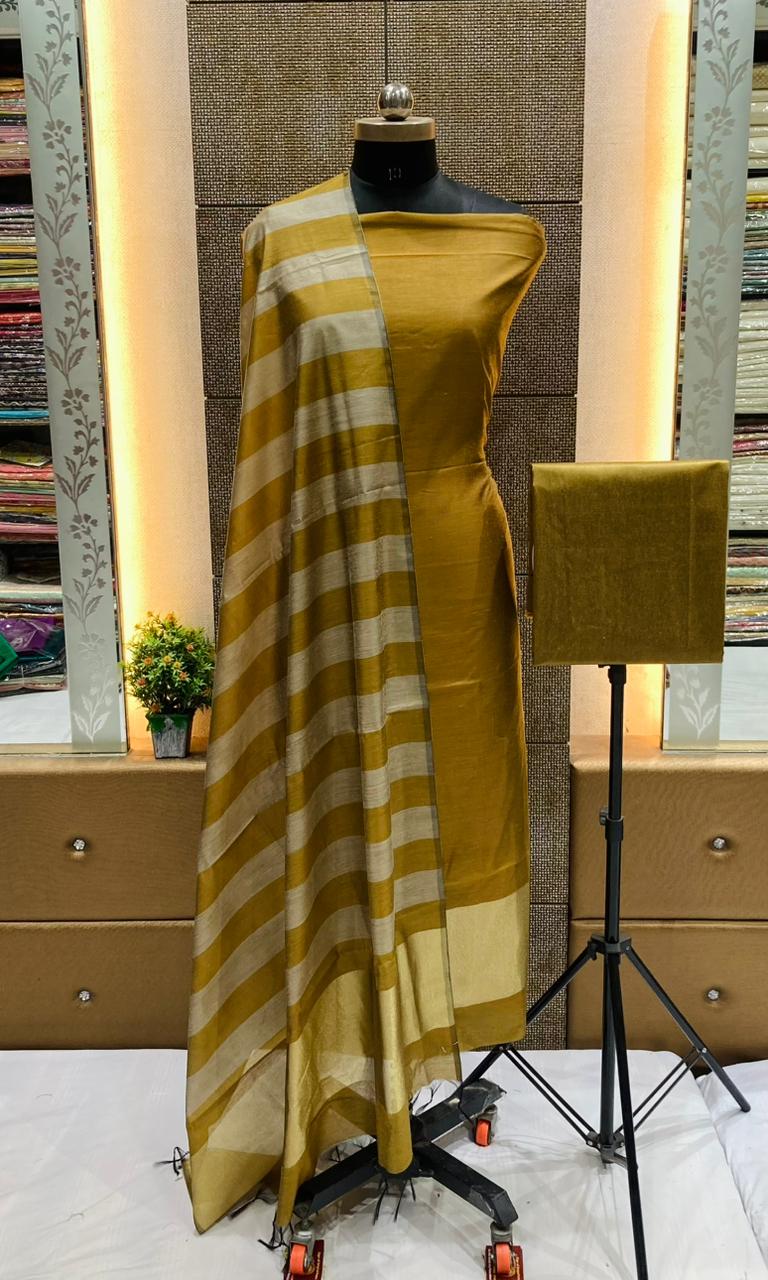 Exclusive Banarasi Unstitched Salwar kameez with Dupatta🦋*   *BANARASI SUIT*cotton suit  *TOP- cotton with zari stripe   *DUPATTA- cotton with zari patta cotton  *BOTTOM-* cotton plain  *2.50 meter each*